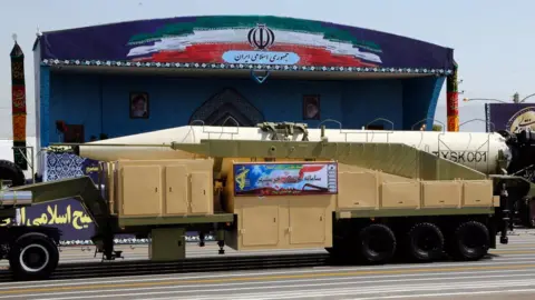 AFP A Khoramshahr medium-range ballistic missile is displayed at a military parade in Tehran, Iran on 22 September 2017