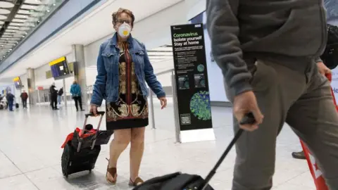 Getty Images Passengers at Heathrow