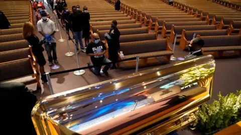 Getty Images Mourners in Houston, 8 June