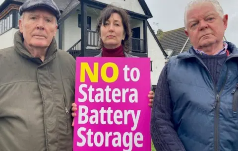 Katharine Da Costa/BBC Protestors against the battery storage