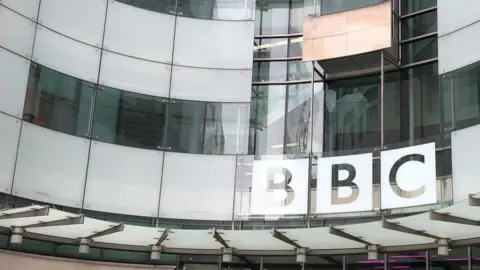 BBC BBC logo and doors into New Broadcasting House in London