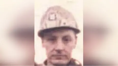 Durham Police Old picture of Edward Donnelly wearing a miner helmet