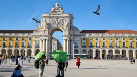 Getty Images Tourists in Lisbon