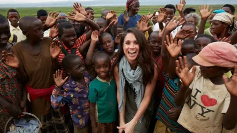 World Vision Meghan Markle surrounded by children in Rwanda during a trip with World Vision Canada