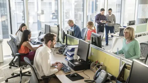 Getty Images Office workers
