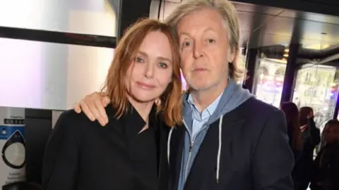 Getty Images Stylist Stella McCartney and her father Paul McCartney in 2019