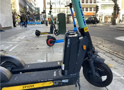 BBC E-scooters on pavement