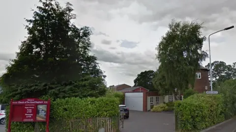 Google The church and windmill prior to the suspected blast