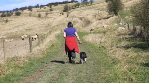 Getty Images Dog walker