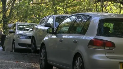 Cars lining the roadside near Catbells