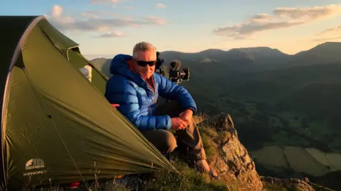 Paul Bacon Terry Abraham on a mountainside