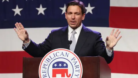 Getty Images Ron DeSantis speaks to guests at the Republican Party of Iowa 2023 Lincoln Dinner