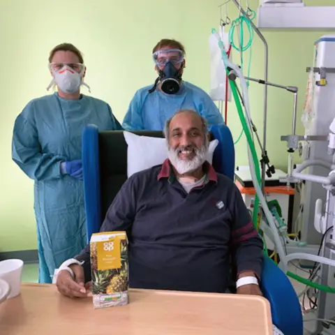 Mohammed with doctors and pineapple juice