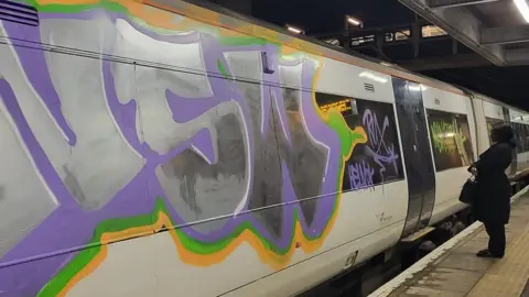 Roy Donovan/Facebook A train carriage covered in graffiti at Laindon railway station