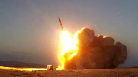 Reuters A missile is launched from an unknown location in Iran in this photo by West Asia News Agency (20 August 2020)