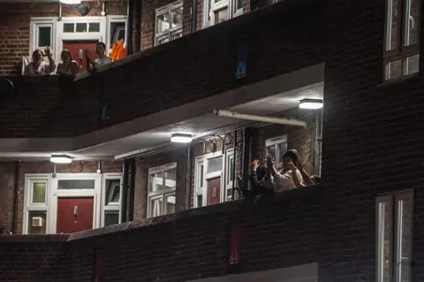 Getty Images Residents in London cheer for the NHS