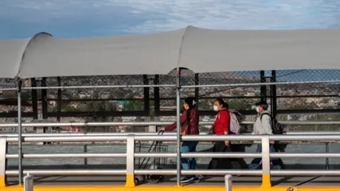 Getty Images The US has closed its border with Mexico to all but essential traffic