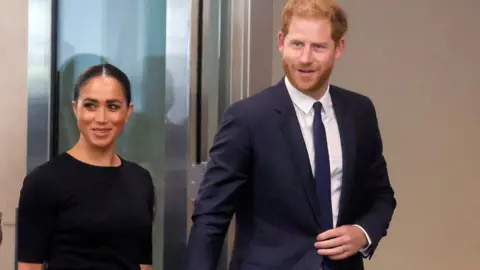 Reuters Harry and Meghan arriving at UN