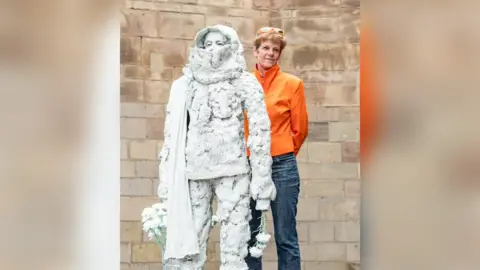 Kat Hannon Photography Boy with Knife Carnation sculpture and artist Brigitte Jurack
