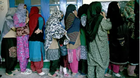 Getty Images Women cast their votes in the state of Jammu and Kashmir