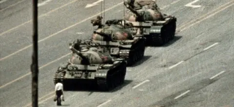 Getty Images Protester stands in way of Chinese tanks in Beijing, 5 June 89