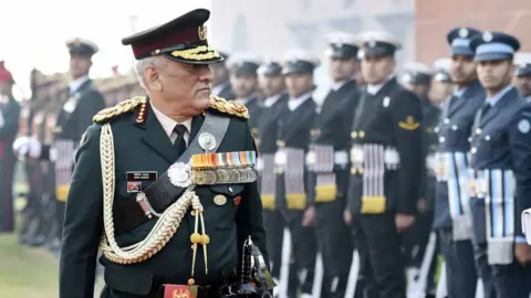 Getty Images India's first Chief of Defence Staff (CDS) Gen Bipin Rawat inspects the Guard of Honour, at South Block lawns, on January 1, 2020 in New Delhi, India.