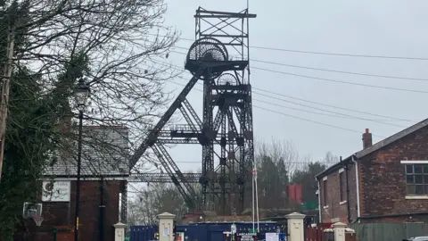 BBC Wrought iron lattice headgear and the engine house in the Lancashire Mining Museum