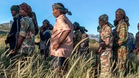 Getty Images Amhara militia men, that combat alongside federal and regional forces against northern region of Tigray,