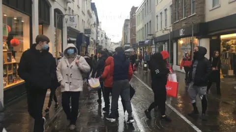 BBC Jersey shoppers in masks on St Helier high street