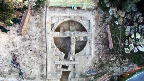 EPA An aerial view of the beehive tombs discovered near the Palace of Nestor at Pylos in south-western Greece