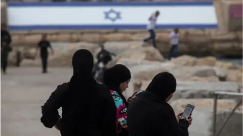 Getty Images Israeli Arab women in Jaffa, Israel (file photo)