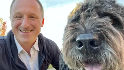 Handout Global Affairs Canada Michael Spavor and his dog