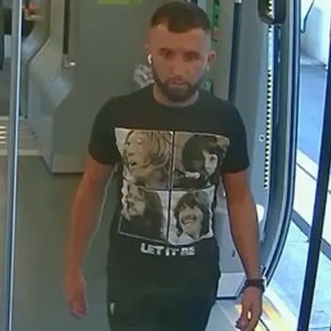 BTP CCTV image of man police want to speak to over rail assault