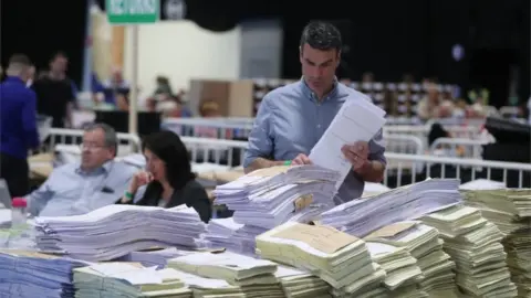 Niall Carson/PA Ballots at the RDS count centre in Dublin