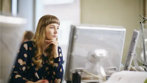 Getty Images A female worker