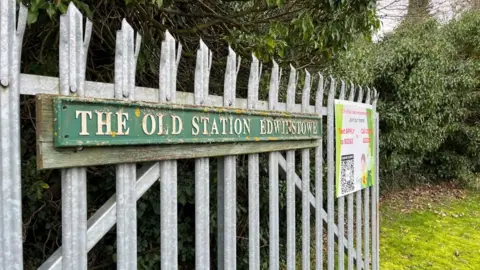 A view of the gate to the former Edwinstowe railway station