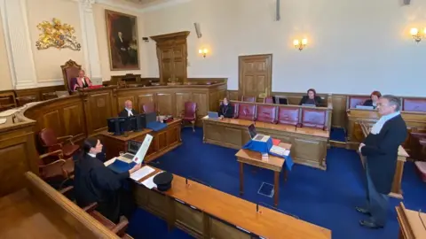 Richard Collas being sworn in