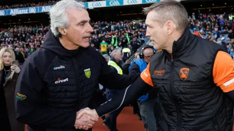 Jim McGuinness and Kieran McGeeney shake hands after Donegal's win over Armagh in the Allianz Football League Division Two Final in late March