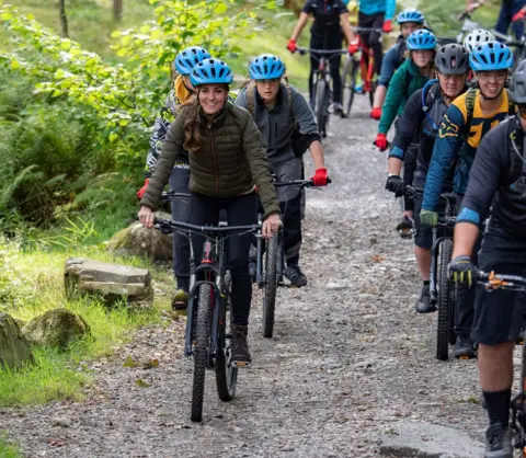 PA Media The duchess also joined a bike ride