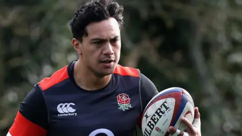 David Rogers Denny Solomona during an England training session