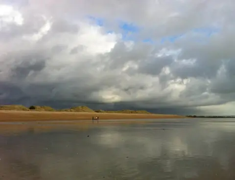 Annie Nelson Reflection of sky in water