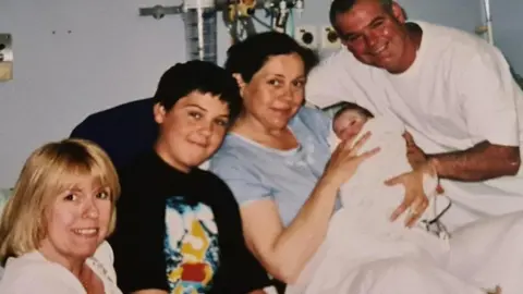 Sharon Gorvett with her family and baby Sophie