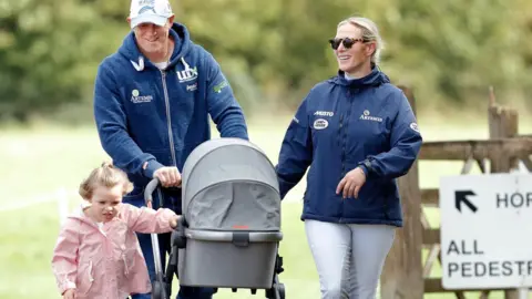 Getty Images Mike Tindall and Zara Tindall with their daughters Mia Tindall and Lena Tindall (in pram) at the Whatley Manor Horse Trials at Gatcombe Park in September 2018