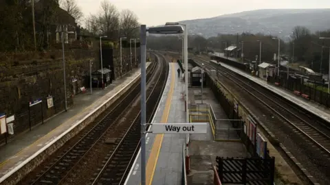 Getty Images Train tracks and platform at Huddersfield station