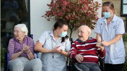 Reuters care home staff and residents