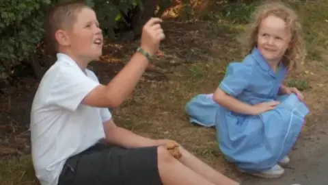 Family handout Megan Hurley with her brother Bradley
