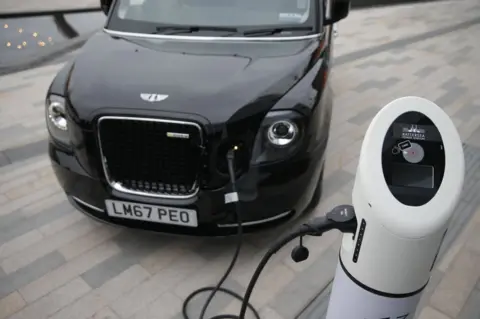 Getty Images London's first electric-powered black cabs being charged