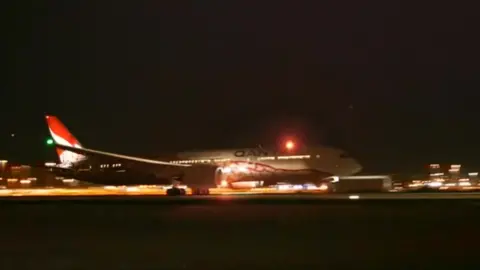 Reuters Plane takes off