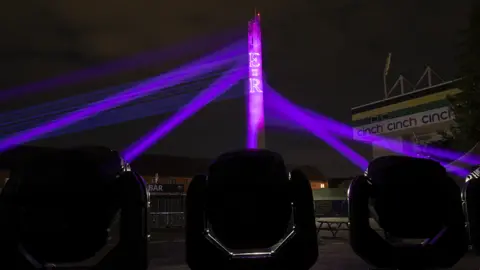 MLE Pyrotechnics Limited The National Lift Tower turned purple in tribute to the Queen