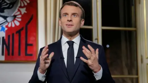 Reuters Macron makes New Year speech